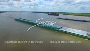 169 Aerial drone view of ship and barge traffic on Mississippi river trade and commerce
