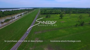 182 suv traveling along river road aerial Louisiana travel and tourism visitors​