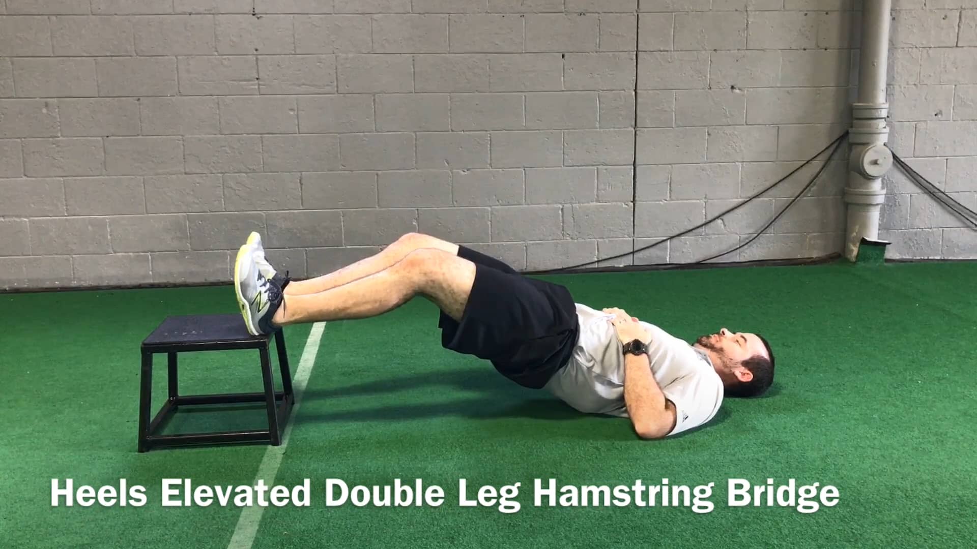 Heels Elevated Double Leg Hamstring Bridge on Vimeo