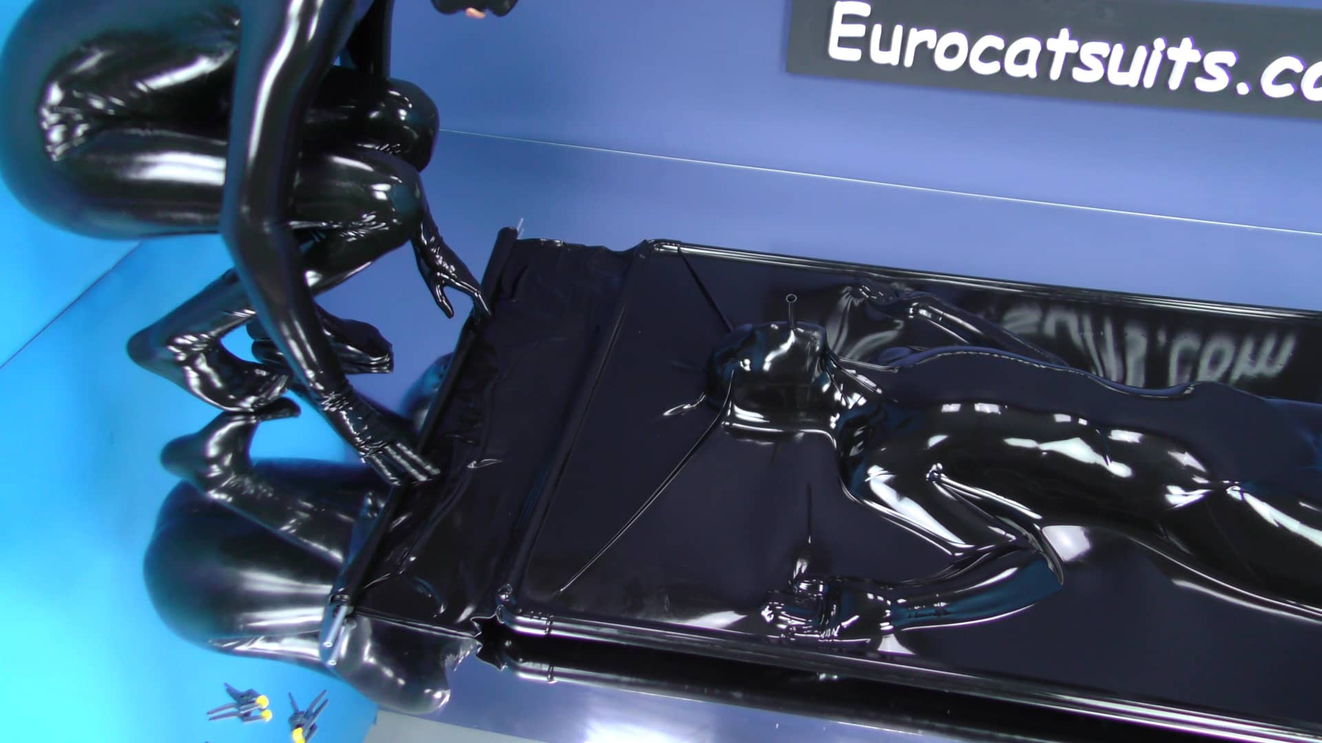 Black latex vacbed ( airtight ) with breathing hose and steel frame