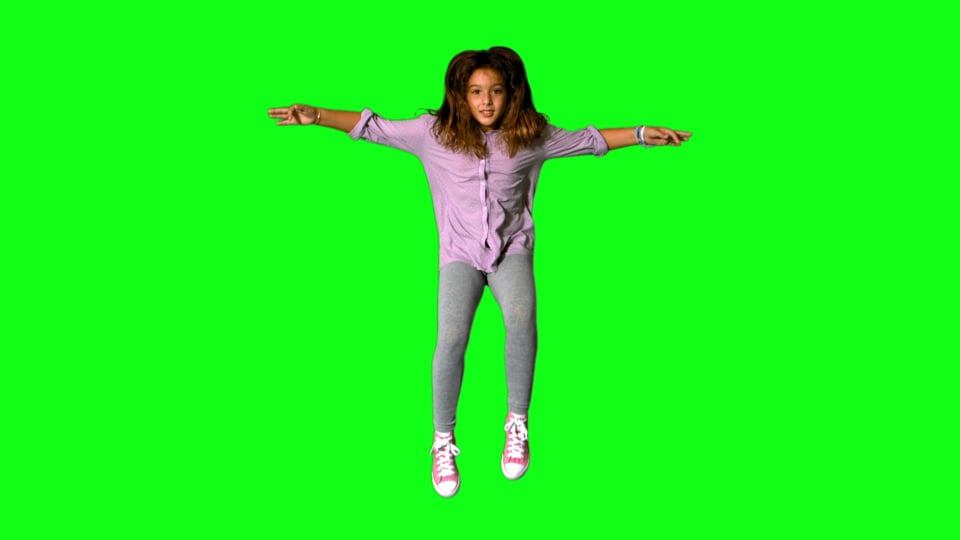 happy-little-girl-jumping-up-and-down-on-green-screen-video-from-pikwizard