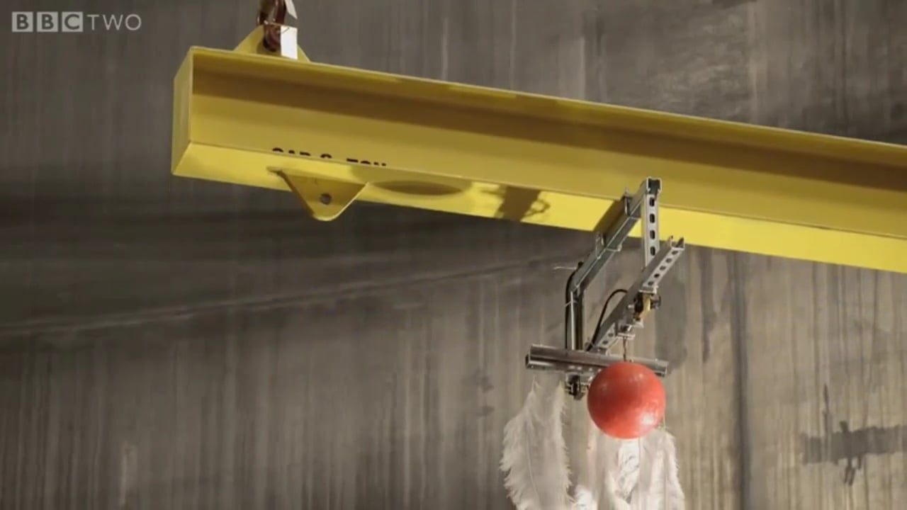 BOWLING BALL VS. FEATHERS IN VACUUM CHAMBER on Vimeo
