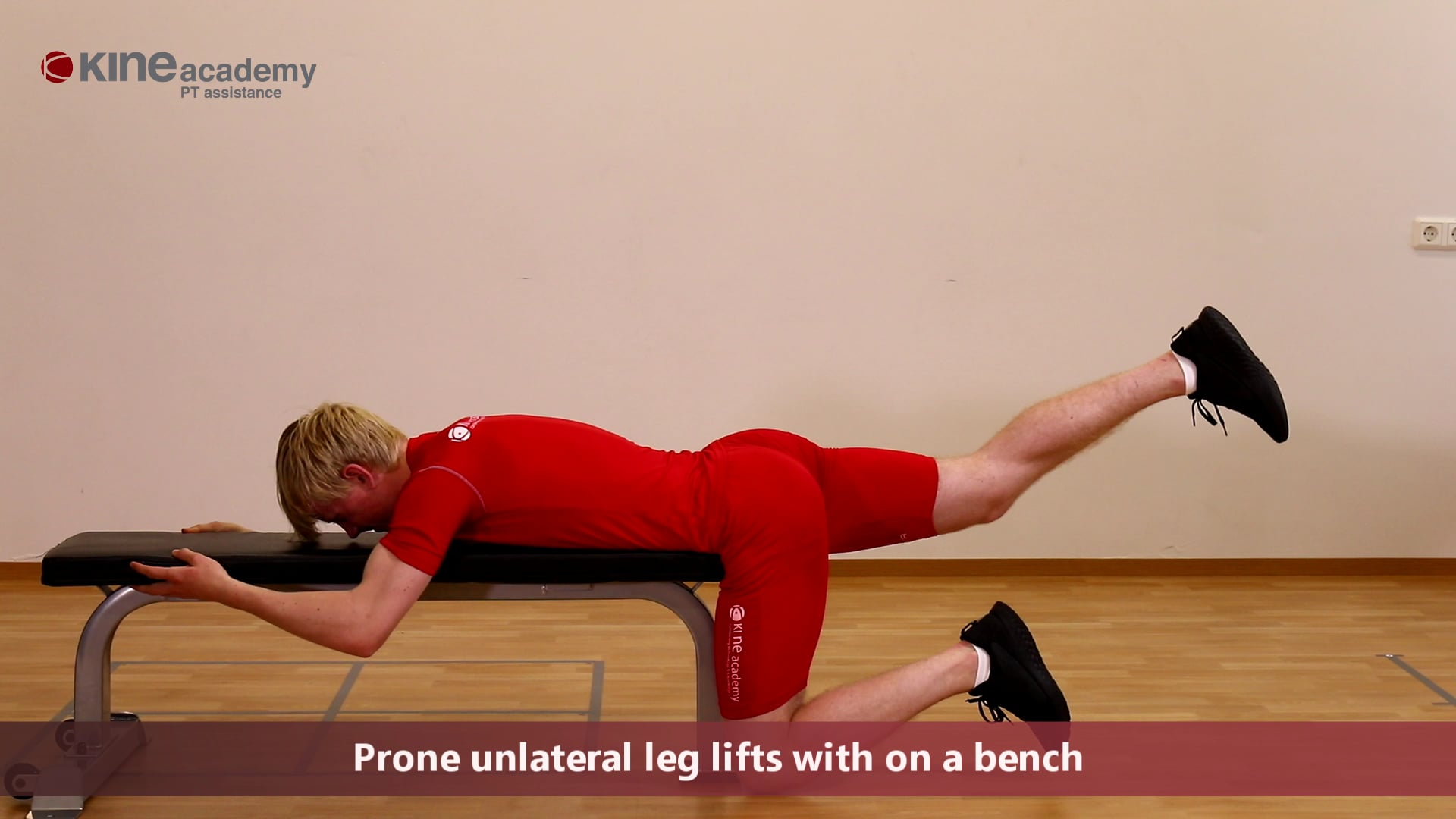 0053-Reverse hip and back extension on a bench - Prone unlateral leg lifts  with on a bench