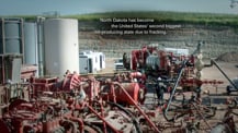 Photo of fracking equipment. Text is toward the top.