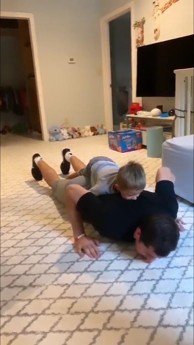 Malkin does pushups with son on back