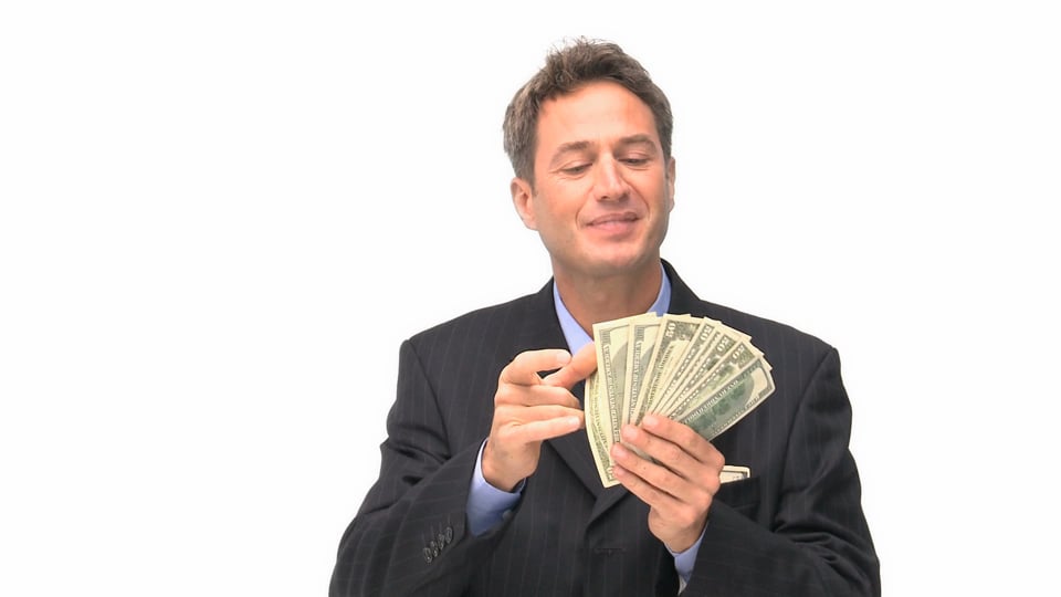 Businessman kissing his money Video from Pikwizard