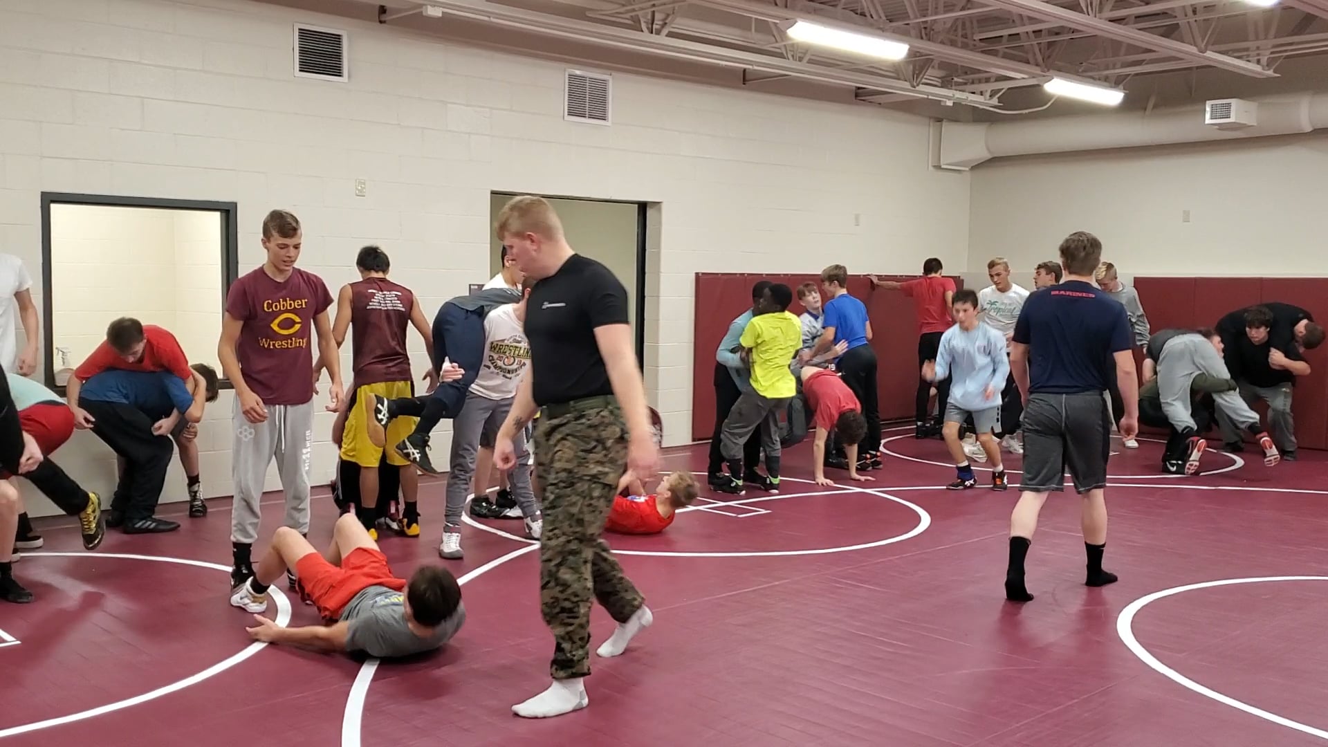Bismarck High Demons with US Marines on Veteran's Day 2019