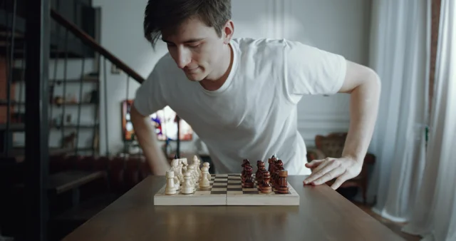 Young Man Playing Game of Chess Online with Friend, Stock Video - Envato  Elements