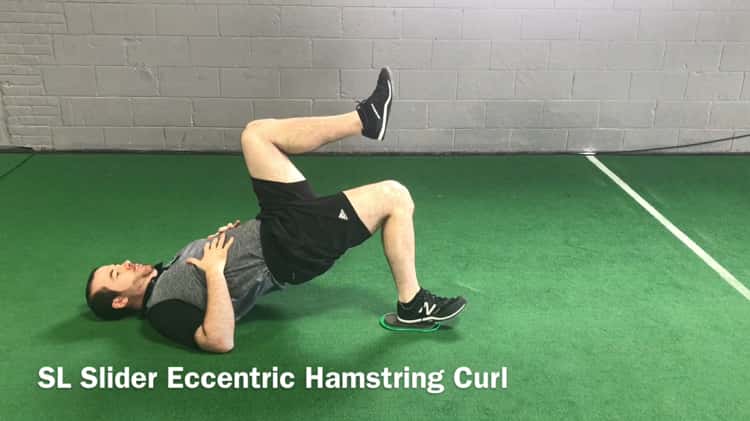 Single Leg Slider Eccentric Hamstring Curl on Vimeo