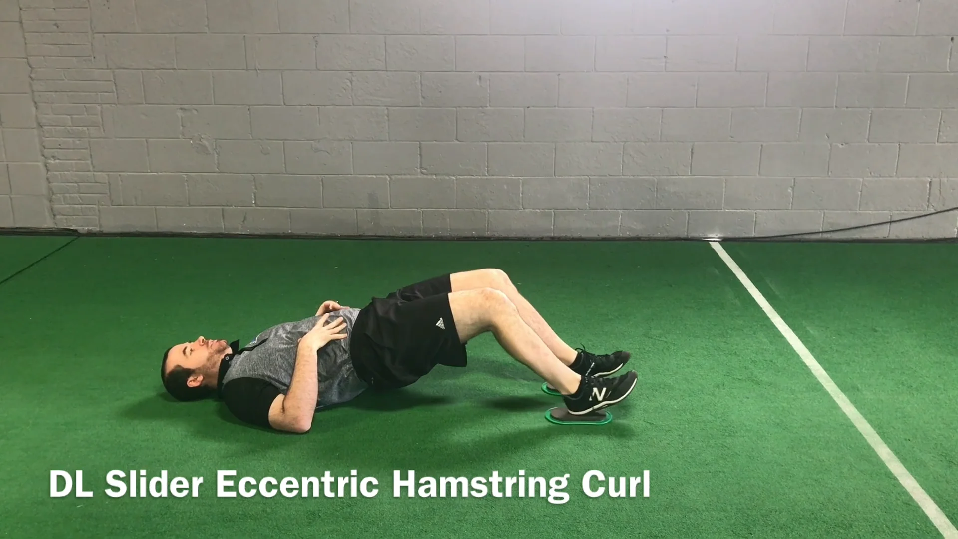 Double Leg Slider Eccentric Hamstring Curl on Vimeo