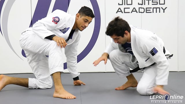 Collar and Arm Drag Sweep Using the Knee Trap