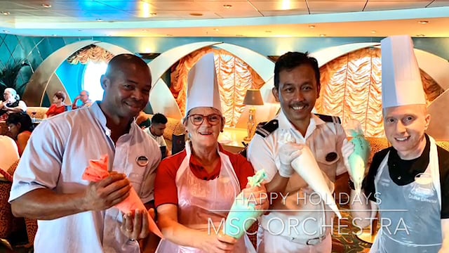 Eric Brouman and team making Holiday Cookies