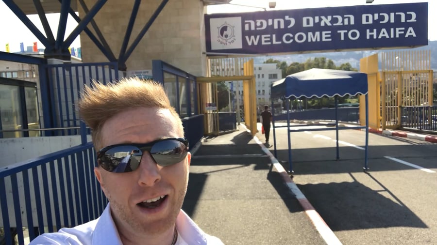 Eric walks over the border in Haifa Israel