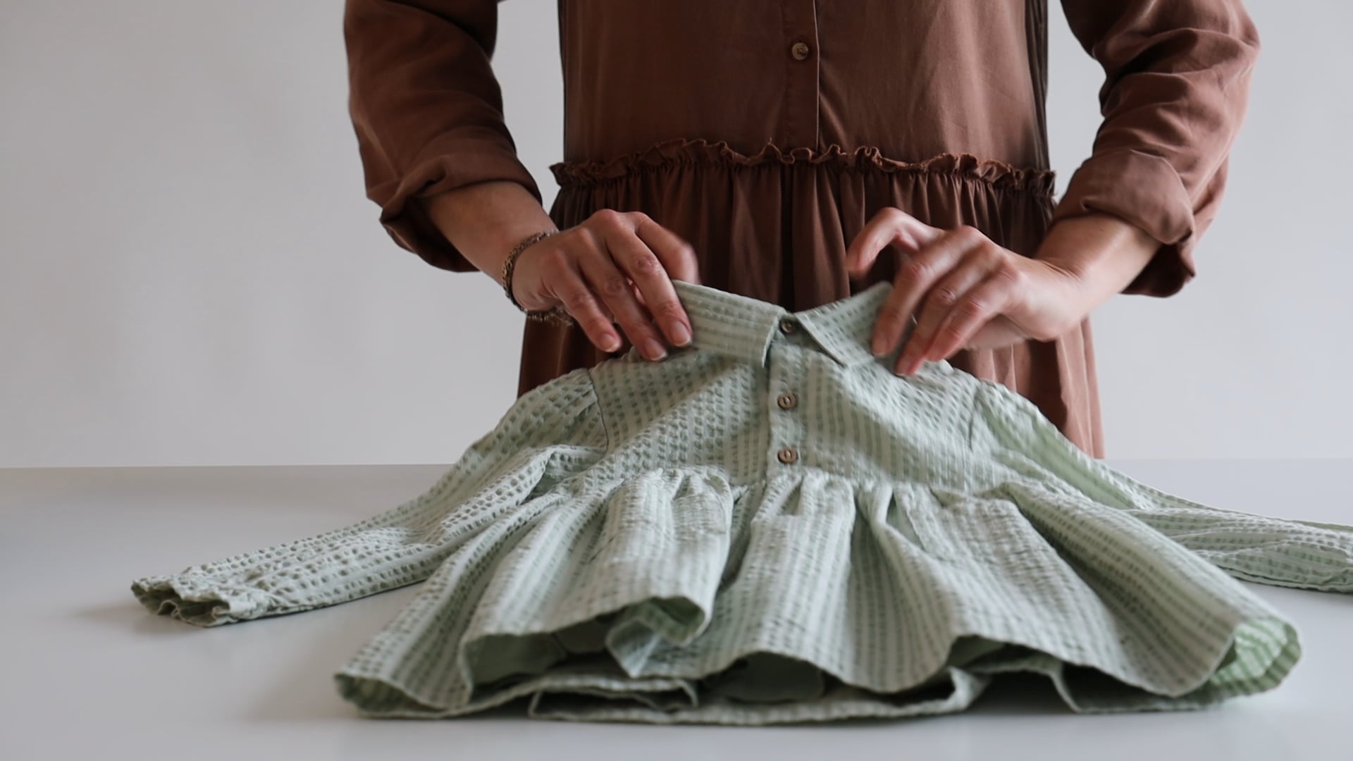 How to fold dresses on Vimeo