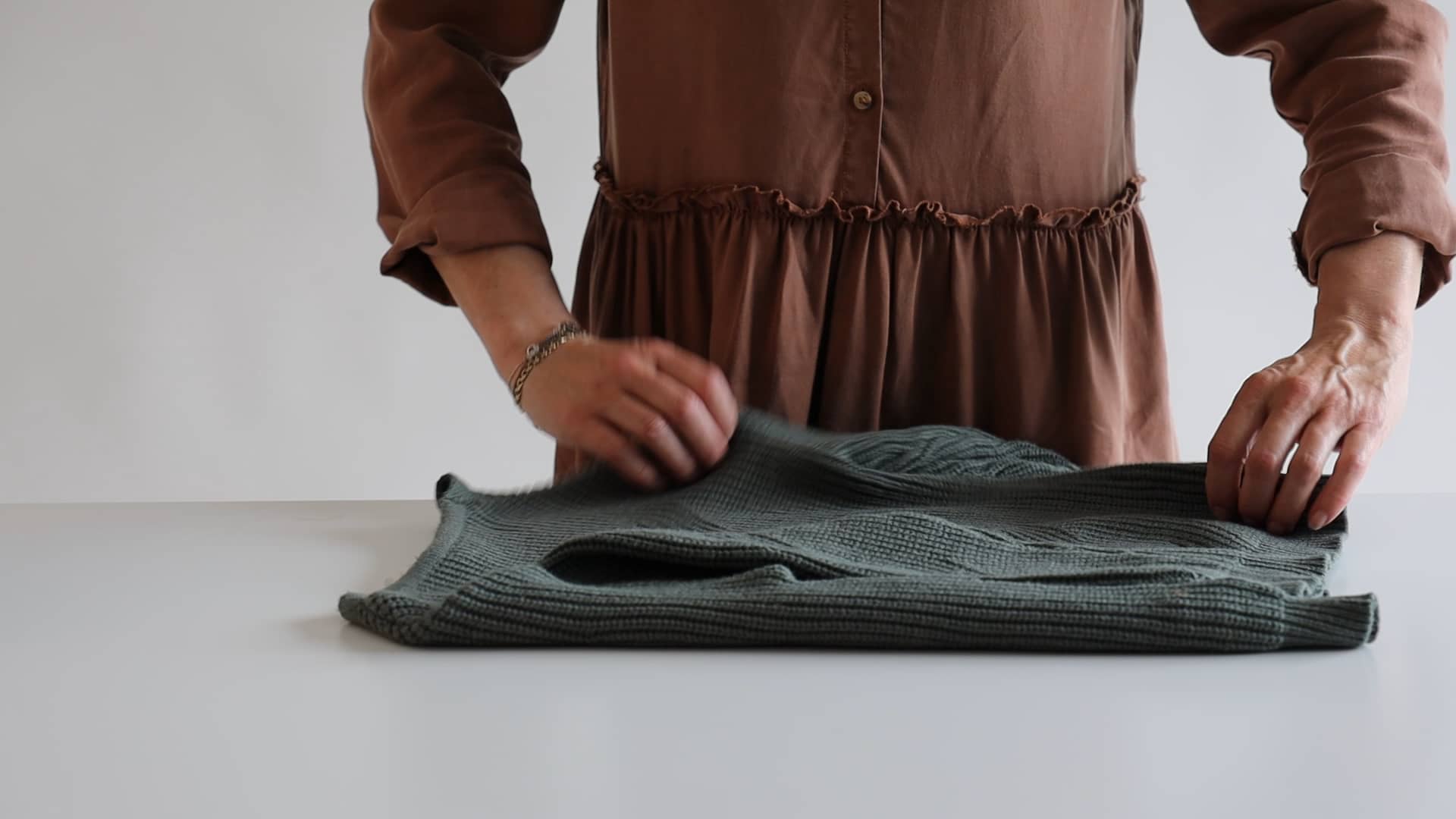 How to fold cardigans on Vimeo