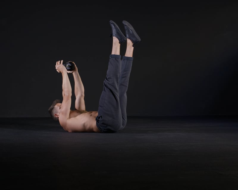 Alternating Leg Raises - Dumbbell