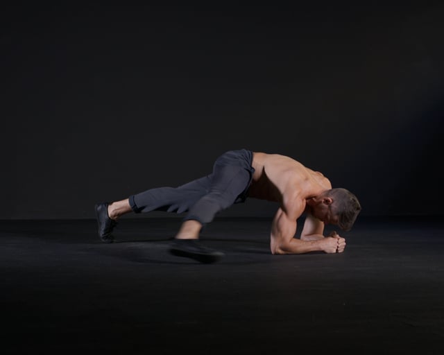 Plank Alternating Toe Taps