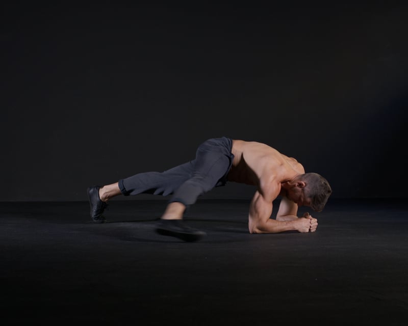 Plank Alternating Toe Taps