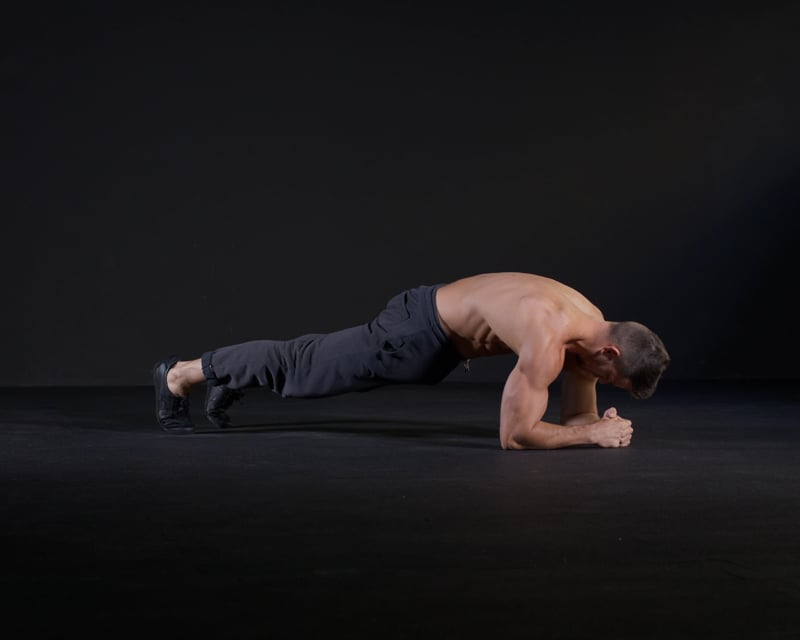 Plank Knees to Elbow