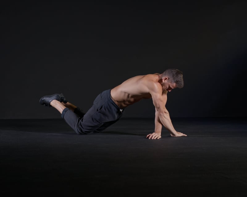 Knee Cross Tricep Extensions