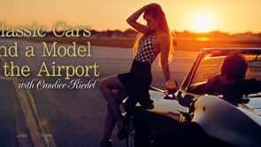 Classic Cars and a Model at the Airport