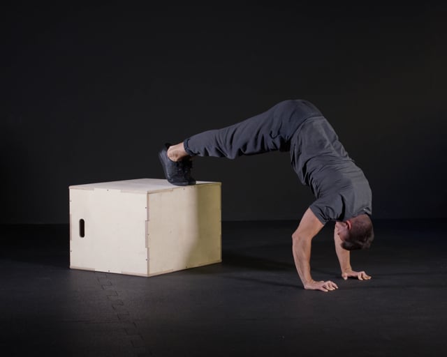 Elevated Slow pike Push Ups ( Pike pushup negative)