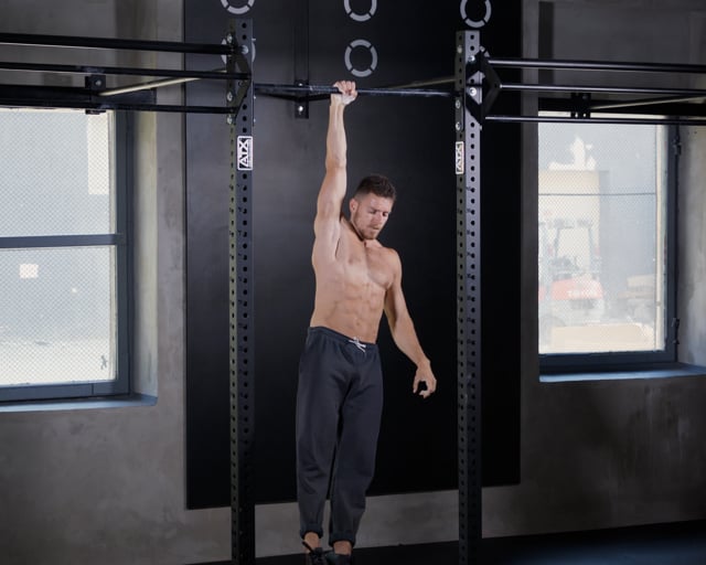 Hanging On The Bar - One Arm