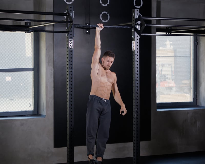 Hanging On The Bar - One Arm