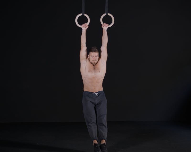 Hanging Knee Raises - Rings