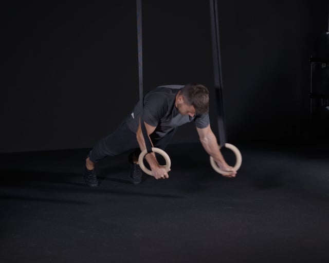 Archer Push Ups - Rings