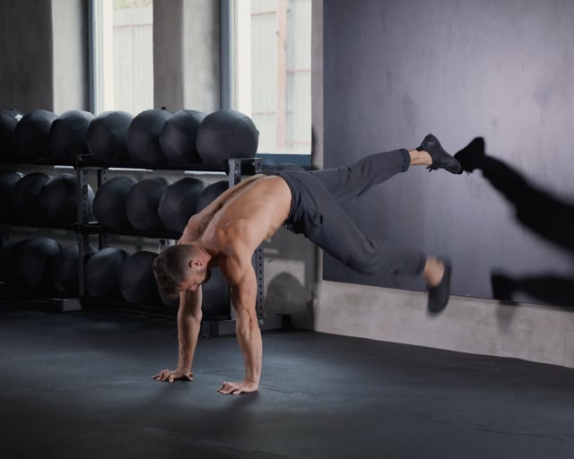 Plank Alternating Hand Reach - Wall