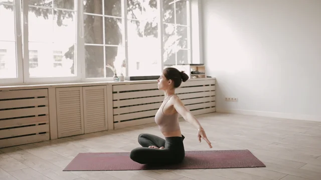 Woman doing yoga in a Hindu dress - Free Stock Video