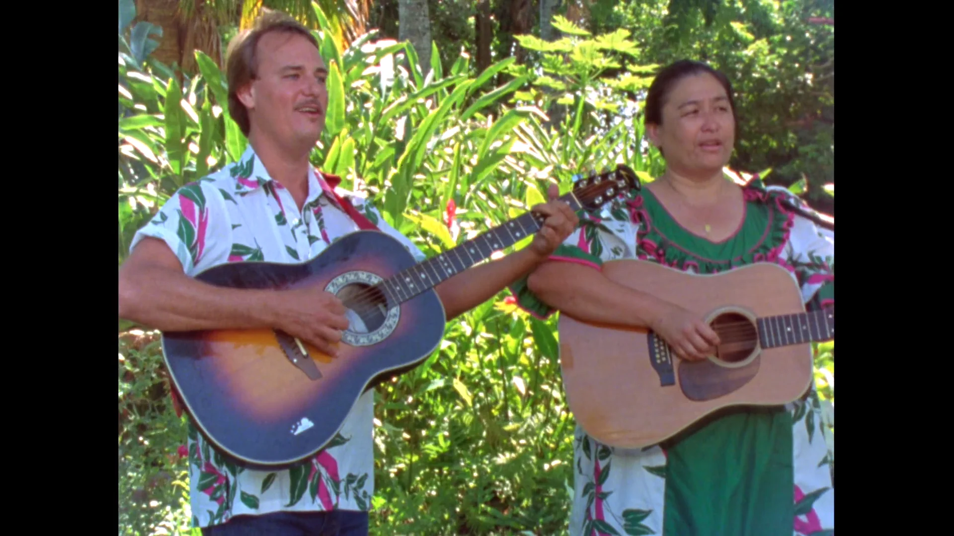 Jerry Santos and Haunani Apoliona perform in Robert Mugge s 1987 film HAWAIIAN RAINBOW