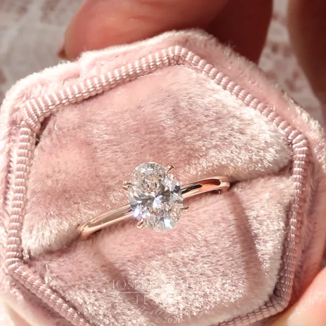 engagement rings, custom engagement rings, solitaire engagement ring  embellished with a four prong signature head item 126429