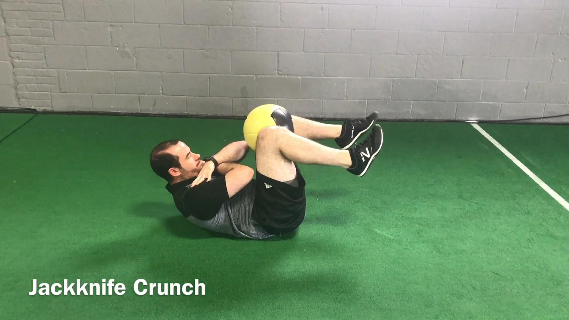 Jackknife sit-up exercise instructions and video