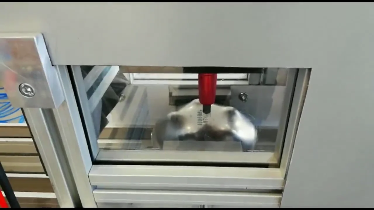 Production line-integrated ADP machine marking on fire estinguisher ...
