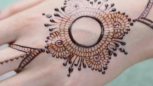 Top Down Video of a Woman Copying the Mehndi Henna Tattoo from One Hand To  the Other in Preparation of the Hindu Stock Photo - Image of intricate,  india: 201867570