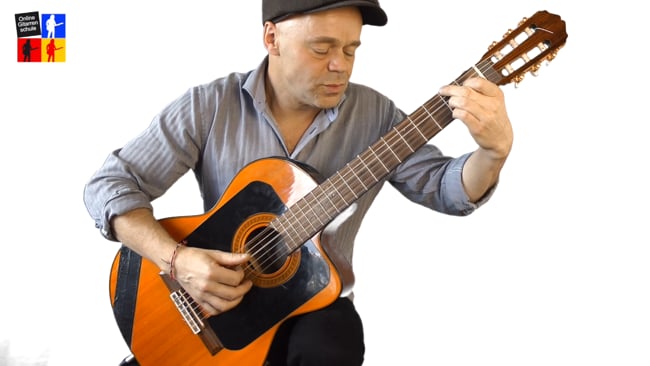 14 Tage Gitarre lernen - Die Gitarre richtig halten