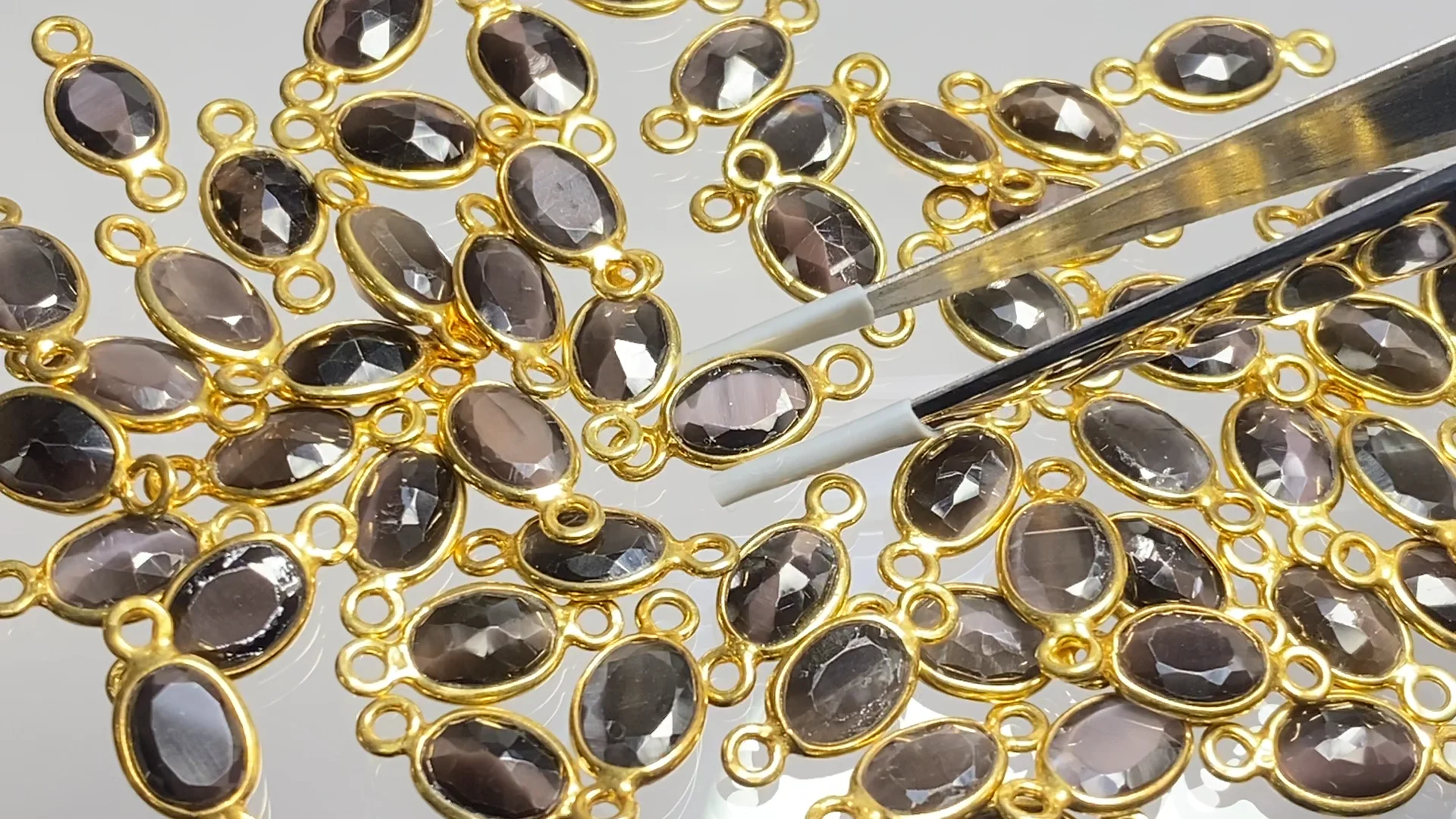 シリマナイト・キャッツアイ 枠留めローズカット8×6mm 【両カン