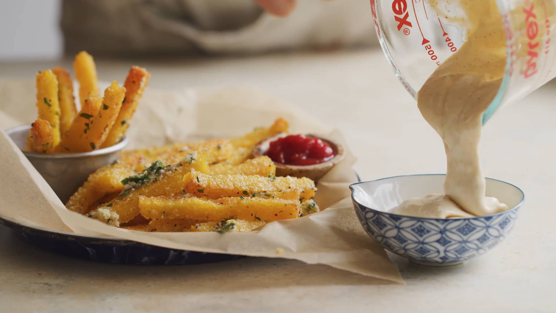 Garlic parmesan herb butter polenta fries with lemon aioli on Vimeo