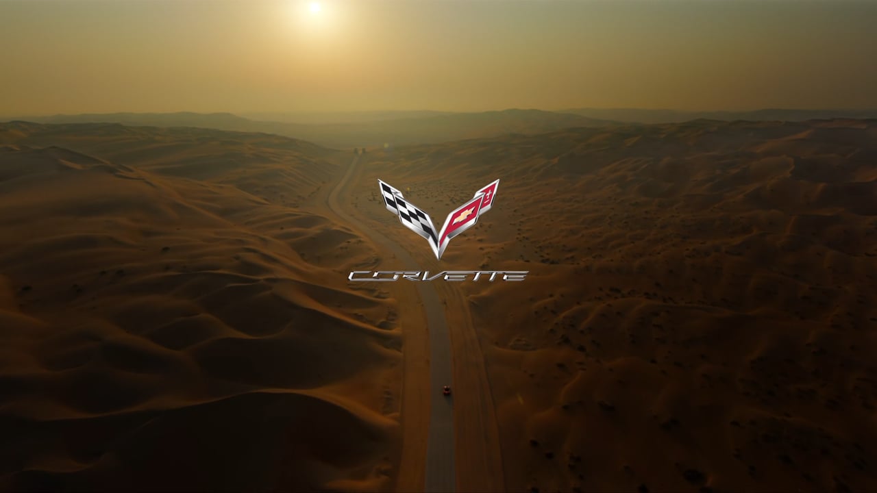 Opening frame of the Chevrolet Corvette commercial over the Liwa dunes at sunrise