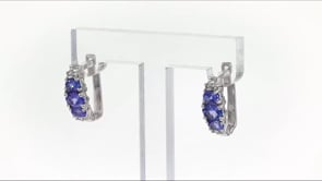 1.30 ct. t.w. Tanzanite and .20 ct. t.w. White Topaz Earrings in Sterling Silver. 58