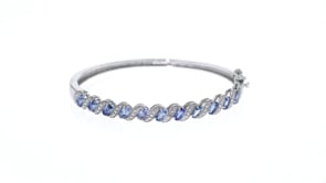1.90 ct. t.w. Tanzanite Bangle Bracelet with Diamond Accents in Sterling Silver