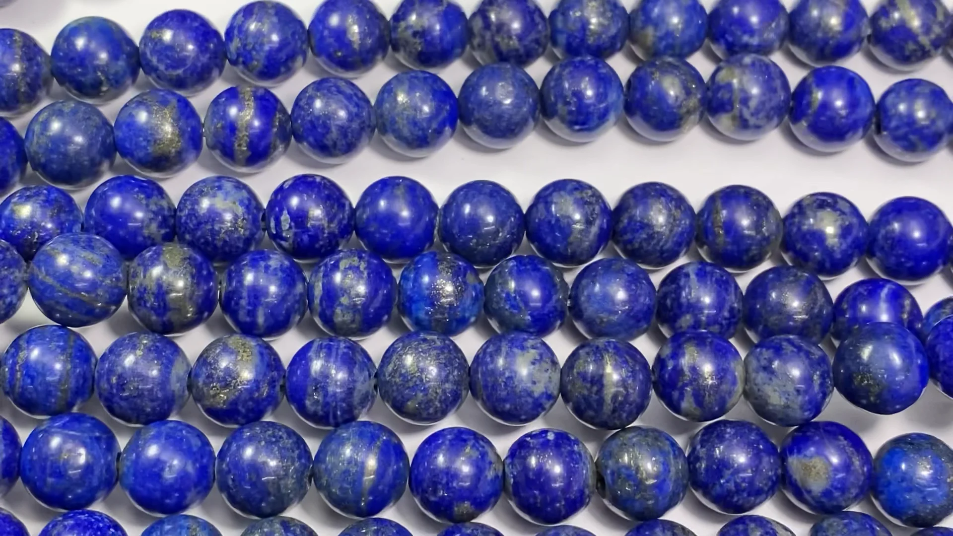 ラピスラズリ10mm／アフガニスタン産／10mm／1連売り／ミラーカット ラピスラズリ ラウンド10mm 【2mm穴】 半連/1連（約35cm
