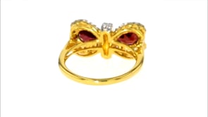 1.70 ct. t.w. Garnet and .60 ct. t.w. White Topaz Bow Ring in 18kt Gold Over Sterling