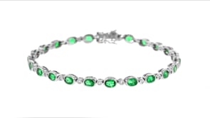3.90 ct. t.w. Emerald and .24 ct. t.w. Diamond Tennis Bracelet in 14kt White Gold