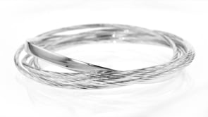 Sterling Silver Textured and Polished Rolling Bangle Bracelet