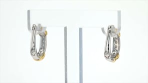 25 ct. t.w. Diamond X Hoop Earrings in Sterling Silver and 14kt Yellow Gold. 58