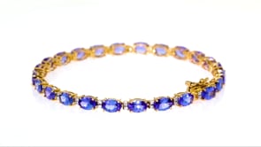 10.00 ct. t.w. Tanzanite and .30 ct. t.w. Diamond Tennis Bracelet in 14kt Yellow Gold