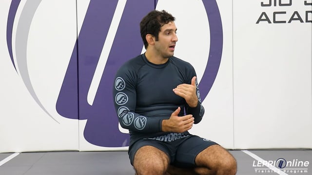 Reverse De La Riva Sweep when Opponent Knee Cuts